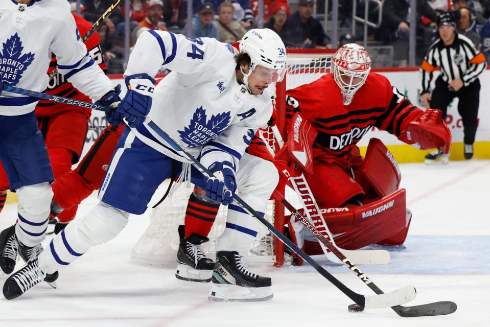 Toronto Maple Leafs center Auston Matthews (34) skates with the puck in the third period against the Detroit Red Wings at Little Caesars Arena in Detroit on Monday, Nov. 28, 2022.