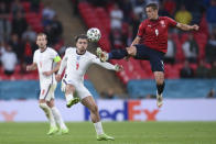 Czech Republic's Tomas Holes, right, and England's Jack Grealish go for the ball during the Euro 2020 soccer championship group D match between Czech Republic and England, at Wembley stadium in London, Tuesday, June 22, 2021. (AP Photo/Laurence Griffiths, Pool)