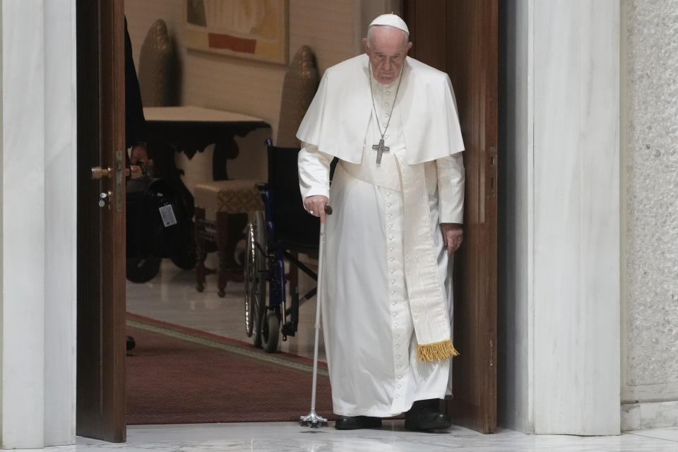 Pope Francis arrives in the Paul VI hall on the occasion of the weekly general audience at the Vatican, Wednesday, Aug. 3, 2022. (AP Photo/Gregorio Borgia)