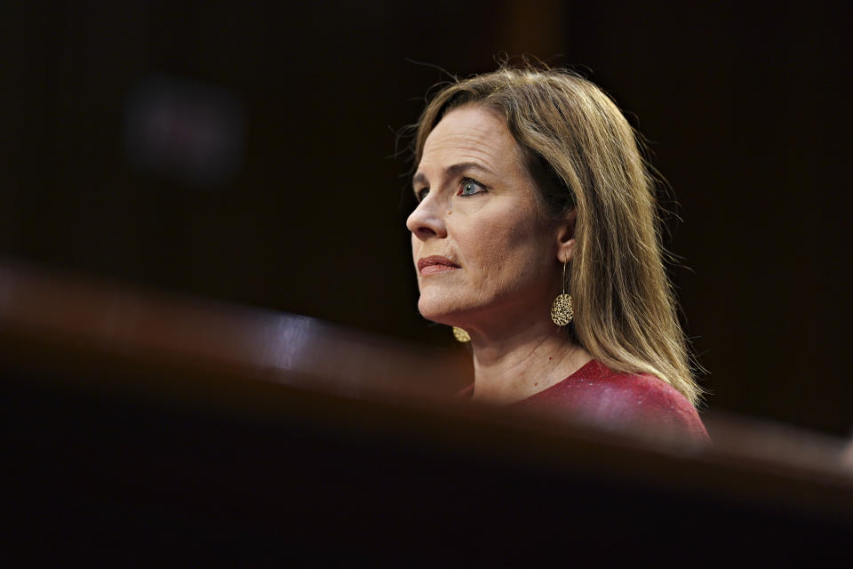 Supreme Court nominee Amy Coney Barrett listens during a confirmation hearing before the Senate Judiciary Committee, Tuesday, Oct. 13, 2020, on Capitol Hill in Washington. (Stefani Reynolds/Pool via AP)