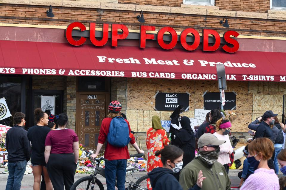 Memorials to George Floyd are set up at the Cup Foods store at the corner of Chicago Avenue and East 38th Street in Minneapolis.