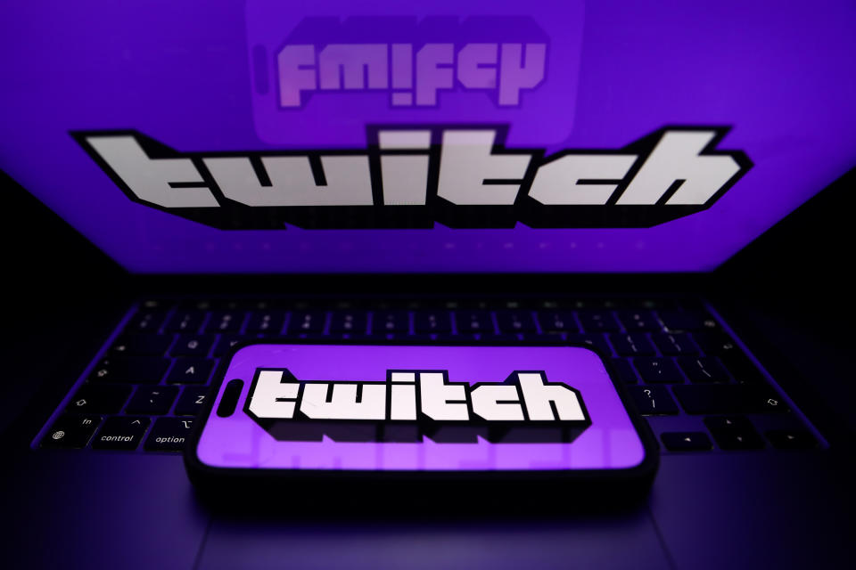 Twitch logo displayed on a laptop screen and Twitch logo displayed on a phone screen are seen in this illustration photo taken in Krakow, Poland on January 7, 2024. (Photo by Jakub Porzycki/NurPhoto via Getty Images)