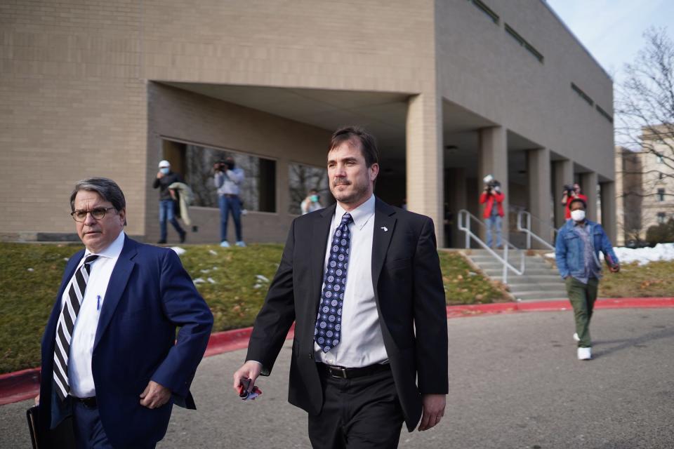 Ex-state health director Nick Lyon exits after making an appearance on a video arraignment at the Genesee County Jail in Flint on Jan. 14, 2021, on new Flint water crisis charges