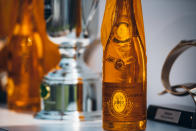<p>A bottle of champagne from main sponsor Louis Roederer complements the trophies. </p>