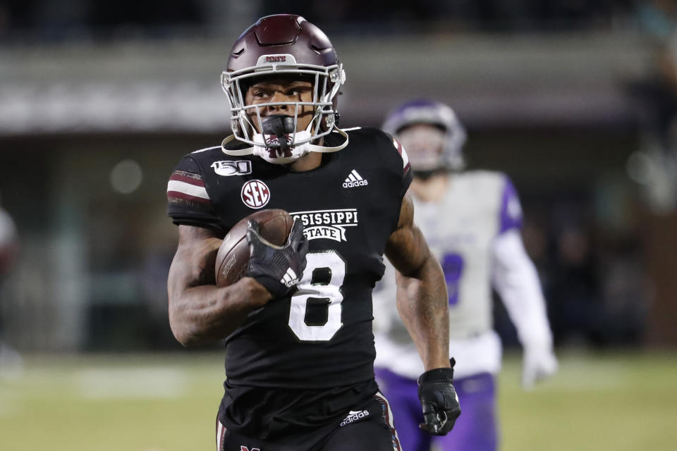 FILE — In this Nov. 23, 2019, file photo, Mississippi State running back Kylin Hill plays against Abilene Christian in an NCAA college football game in Starkville, Miss. Mississippi State is scheduled to play Louisville in the Music City Bowl in Nashville Dec. 30. (AP Photo/Rogelio V. Solis, File)