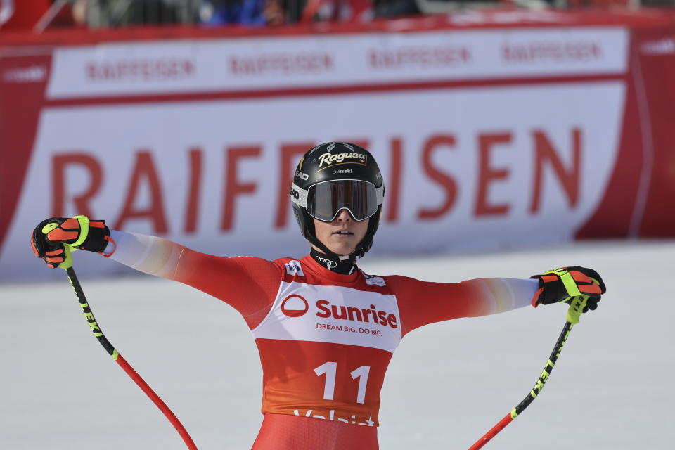 Switzerland's Lara Gut Behrami reacts after completing an alpine ski, women's World Cup downhill race, in Crans Montana, Switzerland, Friday, Feb. 16, 2024. (AP Photo/Marco Trovati)