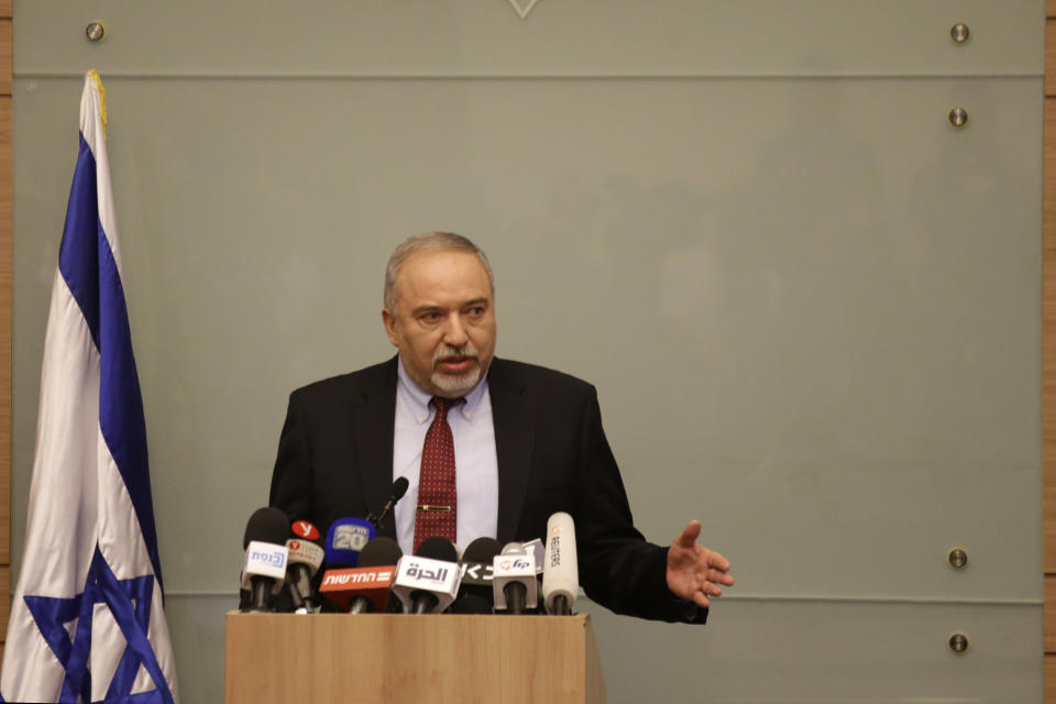 Israeli Defense Minister Avigdor Lieberman delivers a statement at the Knesset, Israel's Parliament, in Jerusalem, Wednesday, Nov. 14, 2018. Lieberman announced his resignation Wednesday over the Gaza cease-fire, making early elections likely. (AP Photo/Ariel Schalit)