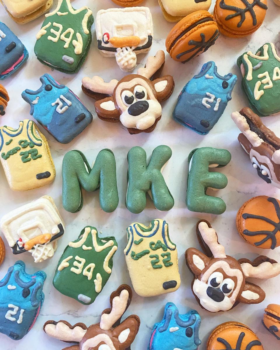 Macaron artist, Kasey Gusho, created Milwaukee Bucks-themed macarons. She and her sister, Brittany Wohlfeil, are expanding their bakery business, Batter & Mac, later this fall.