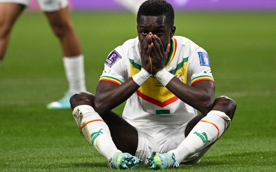 Senegal's midfielder #05 Idrissa Gana Gueye reacts to a missed chance during the Qatar 2022 World Cup Group A football match between Ecuador and Senegal - Ozan Kose/Getty Images