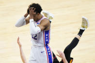 Philadelphia 76ers' Matisse Thybulle, left, reacts after fouling Atlanta Hawks' Kevin Huerter, right, during the second half of Game 7 in a second-round NBA basketball playoff series, Sunday, June 20, 2021, in Philadelphia. (AP Photo/Matt Slocum)