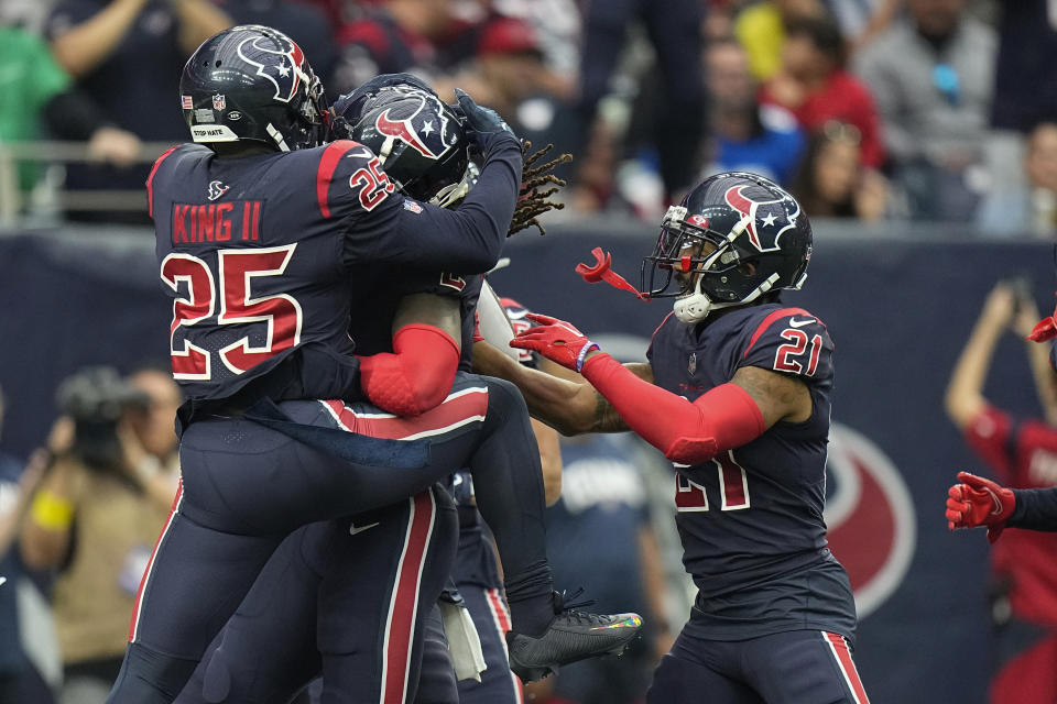Houston Texans cornerback Desmond King II (25) celebrates with his teammates after receiving a fumble by the Cleveland Browns during the first half of an NFL football game between the Cleveland Browns and Houston Texans in Houston, Sunday, Dec. 4, 2022,. (AP Photo/Eric Gay)