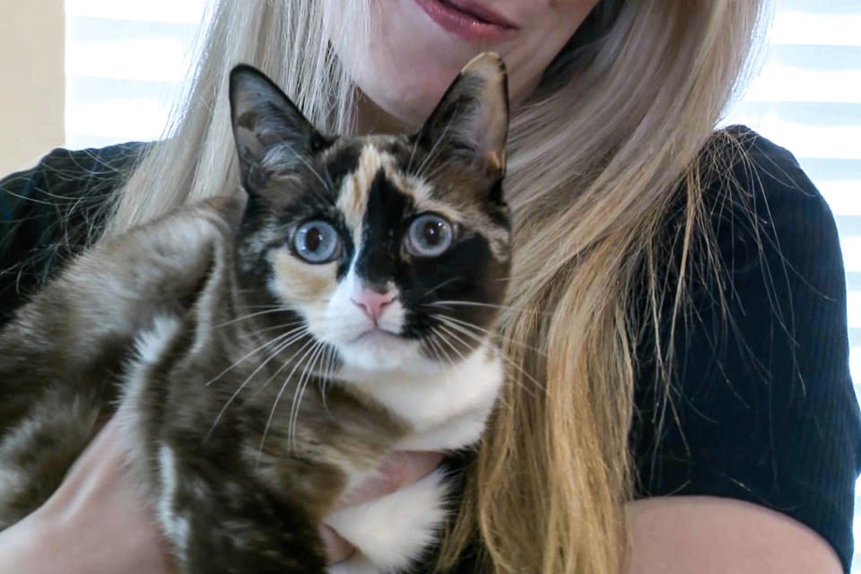 Carrie Clark holds her cat Galena (KSL)