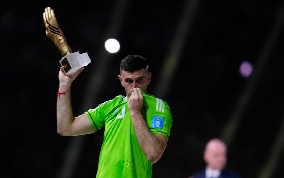 Emiliano Martinez then held the Golden Glove award for best goalkeeper of the tournament in a more conventional manner - AP