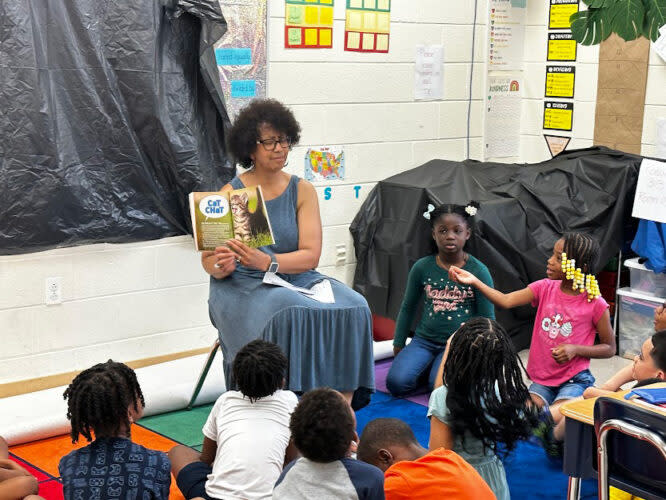 William Penn teacher Lisa Myles reads to students during summer school. Over 1,100 students are enrolled this summer, up from around 750 last year. (William Penn School District)