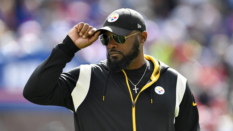 Pittsburgh Steelers head coach Mike Tomlin walks on the sideline during the first half of an NFL football game against the Buffalo Bills in Orchard Park, N.Y., Sunday, Oct. 9, 2022. (AP Photo/Adrian Kraus)