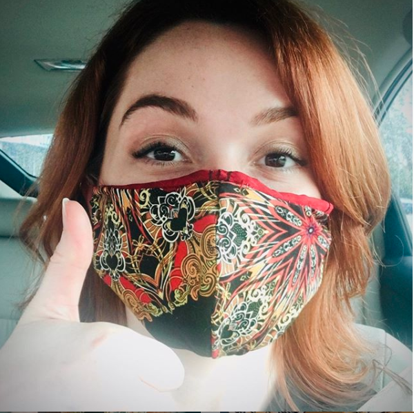 Jennifer Stone in a face mask