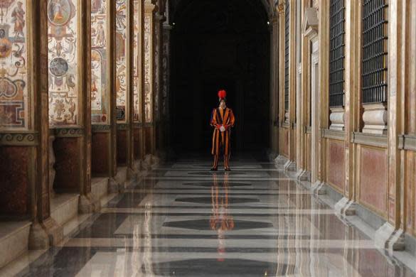 A Swiss Guard stands during a private audience between Pope Benedict XVI and Armenian President Serzh Sargsyan at the Vatican December 12, 2011.