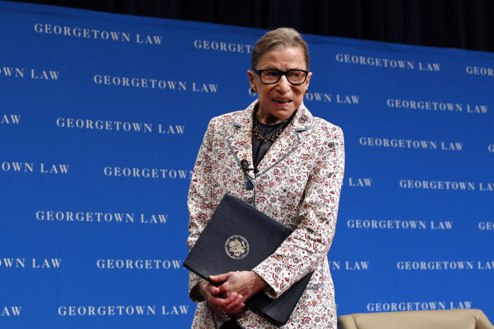 Supreme Court Justice Ruth Bader Ginsburg leaves the stage after speaking to first-year students at Georgetown Law in Washington. Ginsburg has been hospitalized after fracturing three ribs in fall at court (Photo: AP/Jacquelyn Martine)