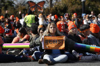 <p>A woman holds up a sign that says, “resist,” as supporters of the Deferred Action for Childhood Arrivals (DACA) block an intersection near the U.S. Capitol as an act of civil disobedience in support of DACA recipients, Monday, March 5, 2018, on Capitol Hill in Washington. (Photo: Jacquelyn Martin/AP) </p>