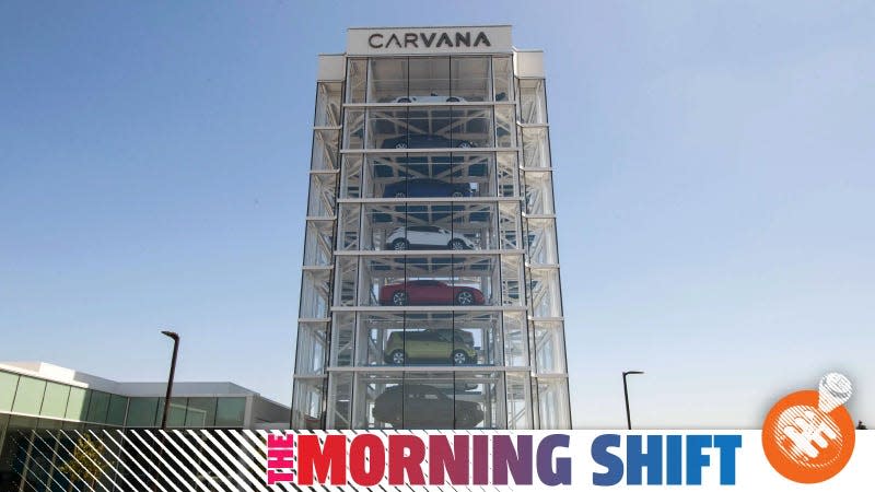 A photo of the Carvana glass tower of cars with The Morning Shift banner along the bottom. 