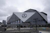 The exterior of the Mercedes-Benz Stadium in Atlanta is shown Friday afternoon, Sept. 17, 2021 in Atlanta. Officials were touring the stadium Friday as part of the FIFA World Cup 2026 Candidate Host City Tour. (AP Photo/Ben Gray)