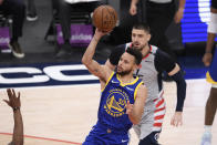 Golden State Warriors guard Stephen Curry (30) shoots during the second half of an NBA basketball game past Washington Wizards center Alex Len, back, Wednesday, April 21, 2021, in Washington. (AP Photo/Nick Wass)