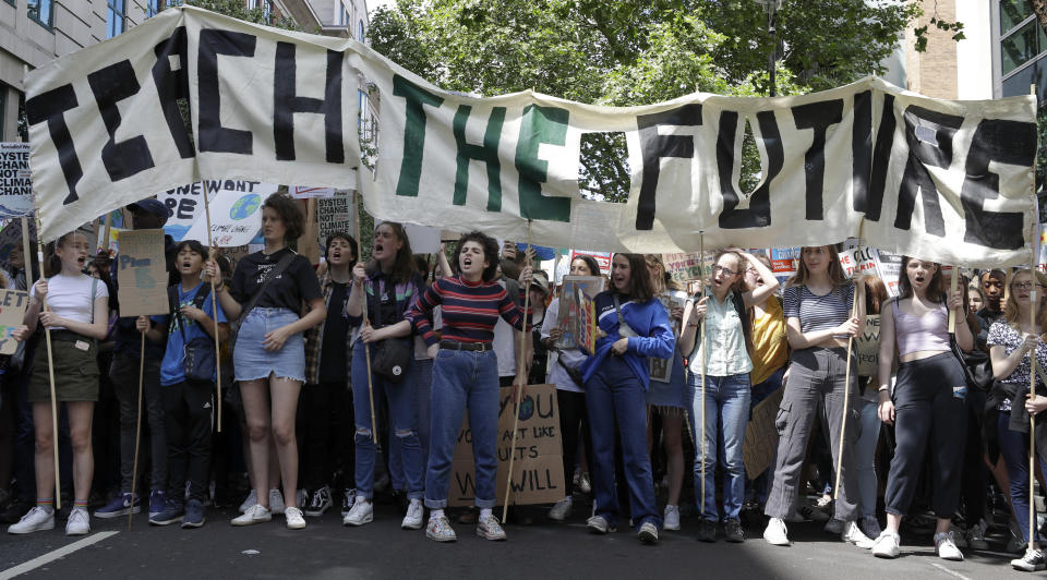 Young demonstrators take part in a demonstration organised by 'Global Strike 4 Climate' near Parliament in London, Friday, May 24, 2019. (AP Photo/Kirsty Wigglesworth)