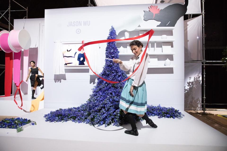 Dancers in front of the Jason Wu display.