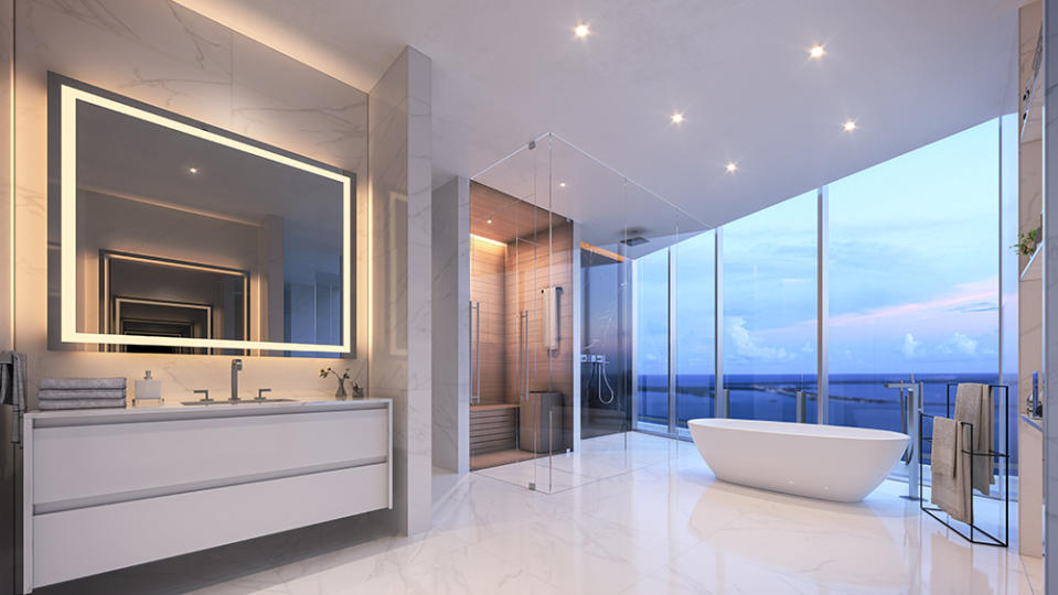 A bathroom with sauna and freestanding tub. - Credit: Photo: Courtesy of Aston Martin Residences