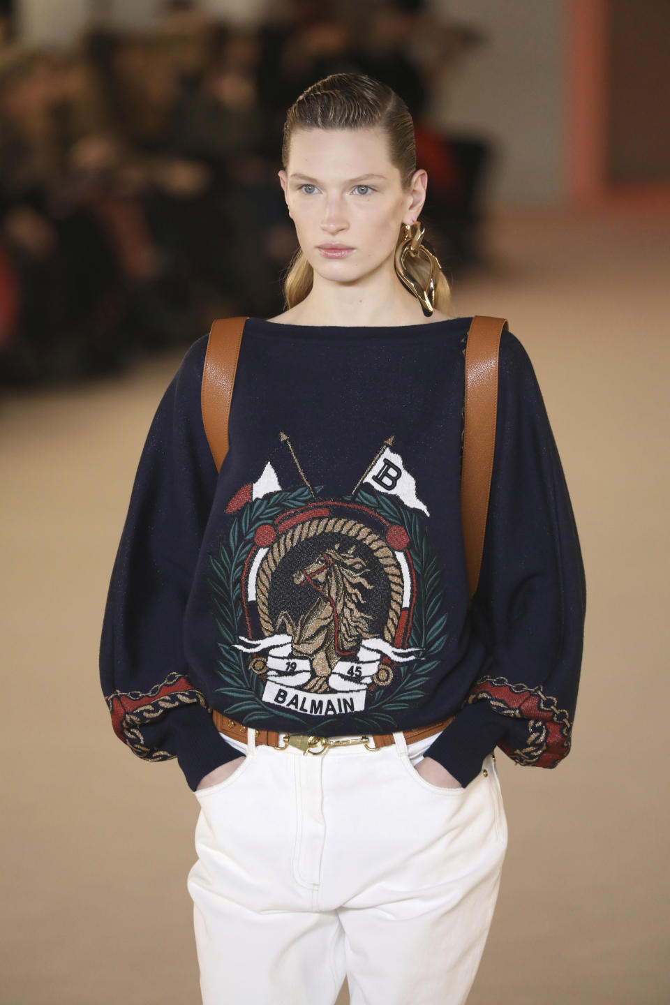 A model wears a creation for the Balmain fashion collection during Women's fashion week Fall/Winter 2020/21 presented in Paris, Friday, Feb. 28, 2020. (Photo by Vianney Le Caer/Invision/AP)