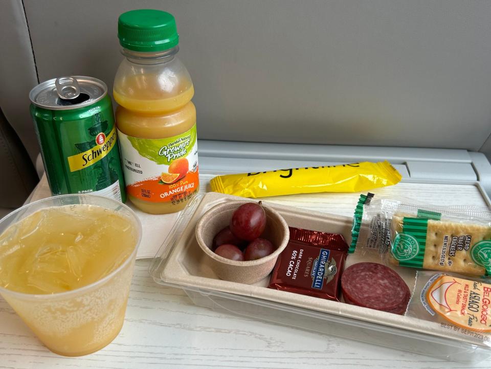 snacks and juice on tray