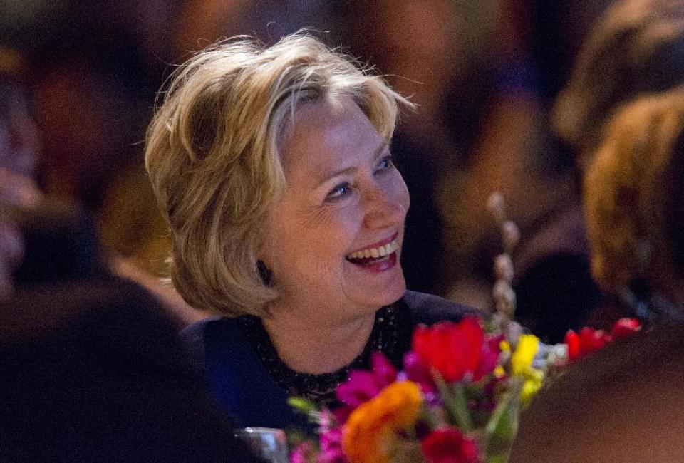 Former Secretary of State Hillary Rodham Clinton listens before receiving the American Jewish Congress' lifetime achievement award on Wednesday March 19, 2014, in New York. (AP Photo/Jin Lee)