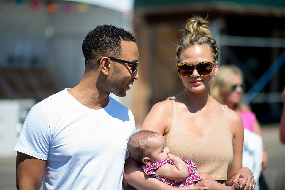 Chrissy Teigen shared a video of baby Luna waving, and it’s out of control how cute it is