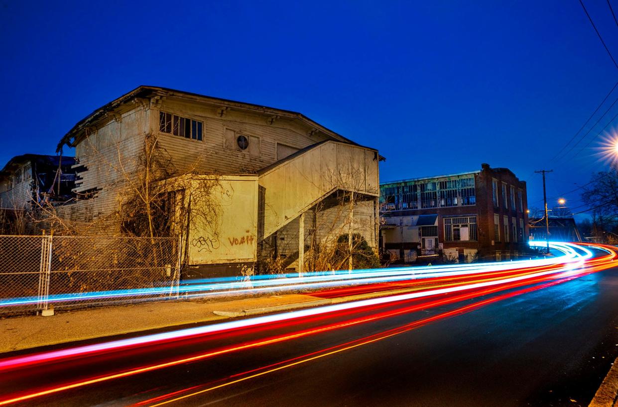 Woonsocket plans to use funding from the American Rescue Plan Act to tear down blighted buildings, such as this derelict mill at 719 River St.