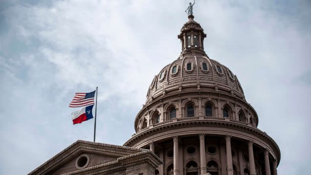 PHOTO: The U.S. and Texas state flags fly over the state Capitol building in Austin, Texas. July 12, 2021.  (Sergio Flores/Getty Images, FILE)