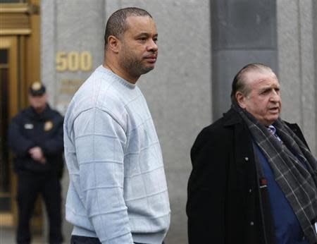 New York State Assemblyman Eric Stevenson (L) and his attorney leave the Manhattan Federal Court in New York April 4, 2013. REUTERS/Brendan McDermid