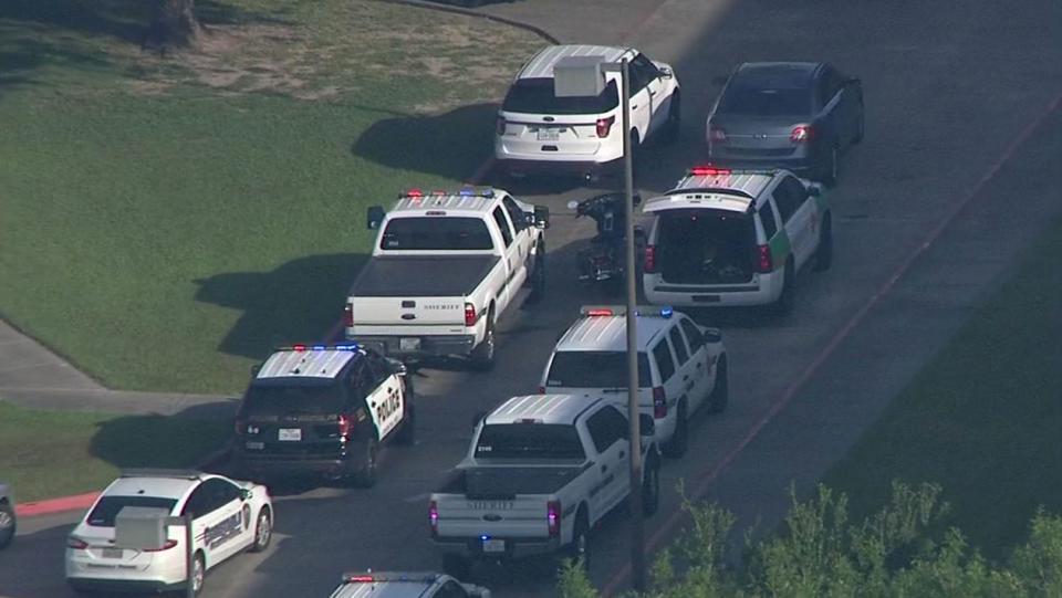 Law enforcement vehicles outside of Santa Fe High School.