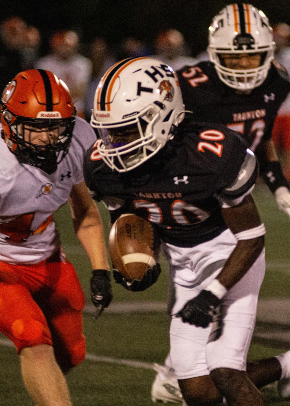 Taunton's Malachi Johnson carries the ball in a non-league game against Middleboro on Friday Sept. 23.