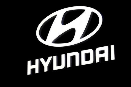 FILE PHOTO: A Hyundai booth displays the company logo at the North American International Auto Show in Detroit, Michigan, U.S., Jan. 16, 2018. REUTERS/Jonathan Ernst/File Photo