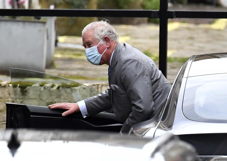 Britain's Prince Charles arrives at the King Edward VII's hospital in London, Saturday Feb. 20, 2021, to visit his father Prince Philip. Buckingham Palace said the husband of Queen Elizabeth II, 99-year-old Prince Philip was admitted to the private King Edward VII Hospital on Tuesday evening after feeling unwell. (Dominic Lipinski/PA via AP)