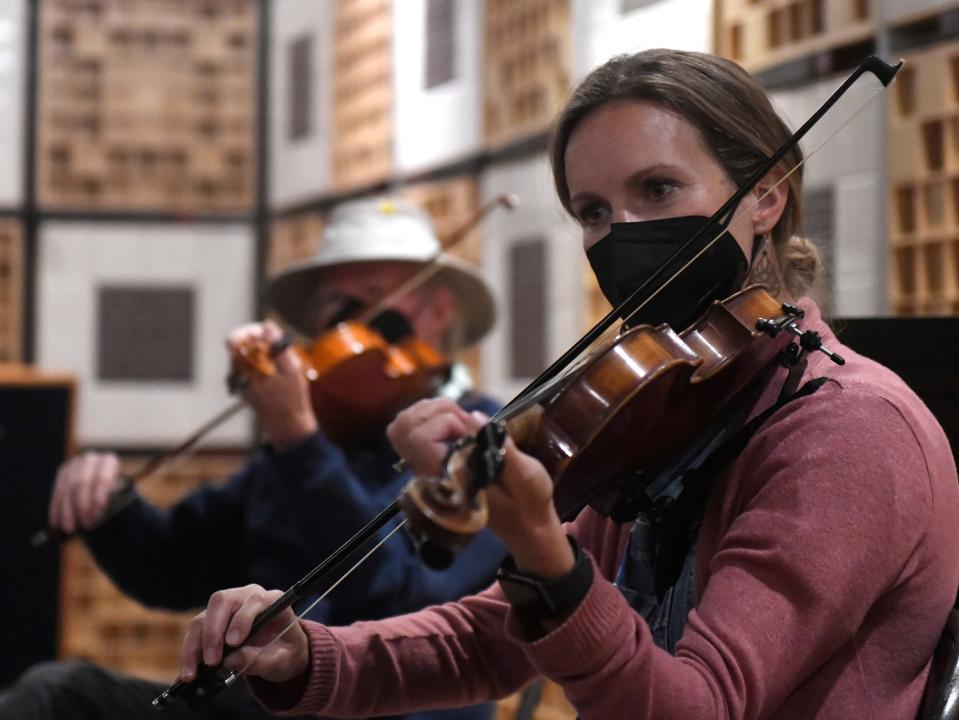 Students play the fiddle during Camp Bluegrass on Wednesday, July 20 at South Plains College in Levelland.