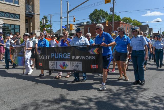 <span class="caption">Survivors of the LGBT Purge take part in the 2019 Pride Parade in Ottawa.</span> <span class="attribution"><span class="source">(Shutterstock)</span></span>