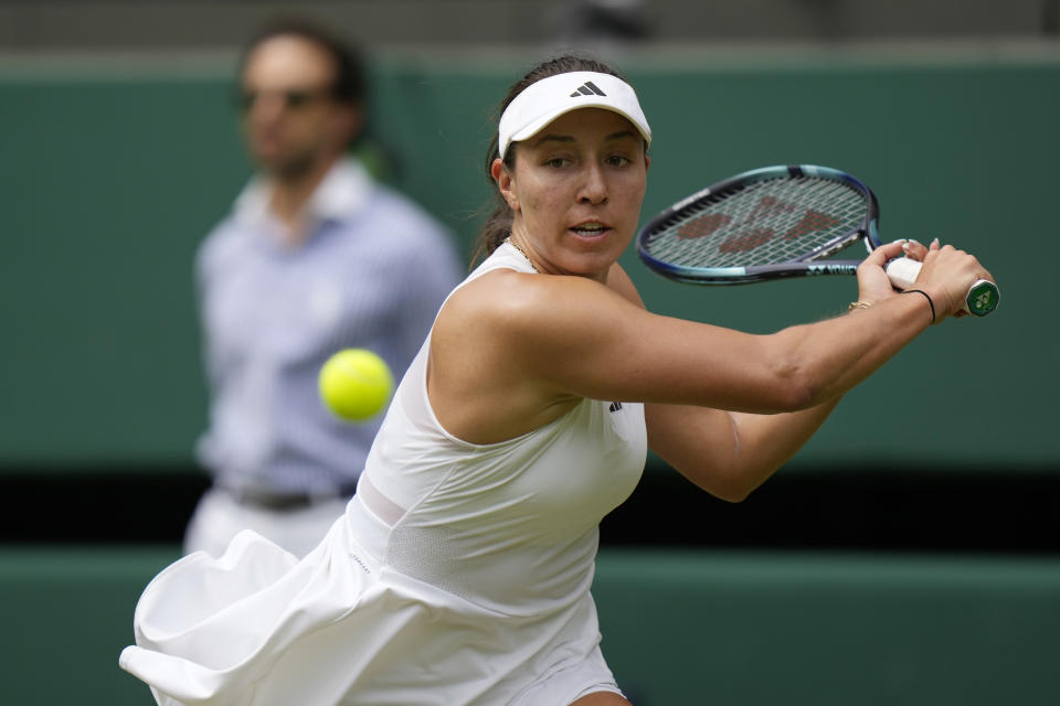 Jessica Pegula of the US plays a return to Ukraine's Lesia Tsurenko during the women's singles match on day seven of the Wimbledon tennis championships in London, Sunday, July 9, 2023. (AP Photo/Alastair Grant)