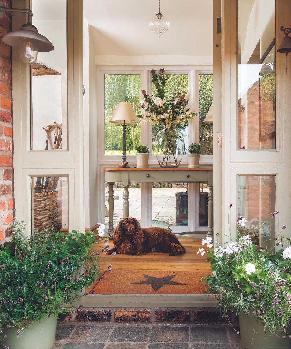 White framed glass doors, potted plants