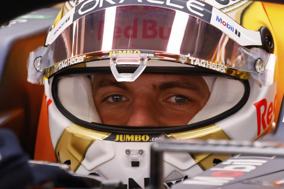 Red Bull driver Max Verstappen of the Netherlands sits in his car during a Formula One pre-season testing session at the Catalunya racetrack in Montmelo, just outside of Barcelona, Spain, Wednesday, Feb. 23, 2022. (AP Photo/Joan Monfort)