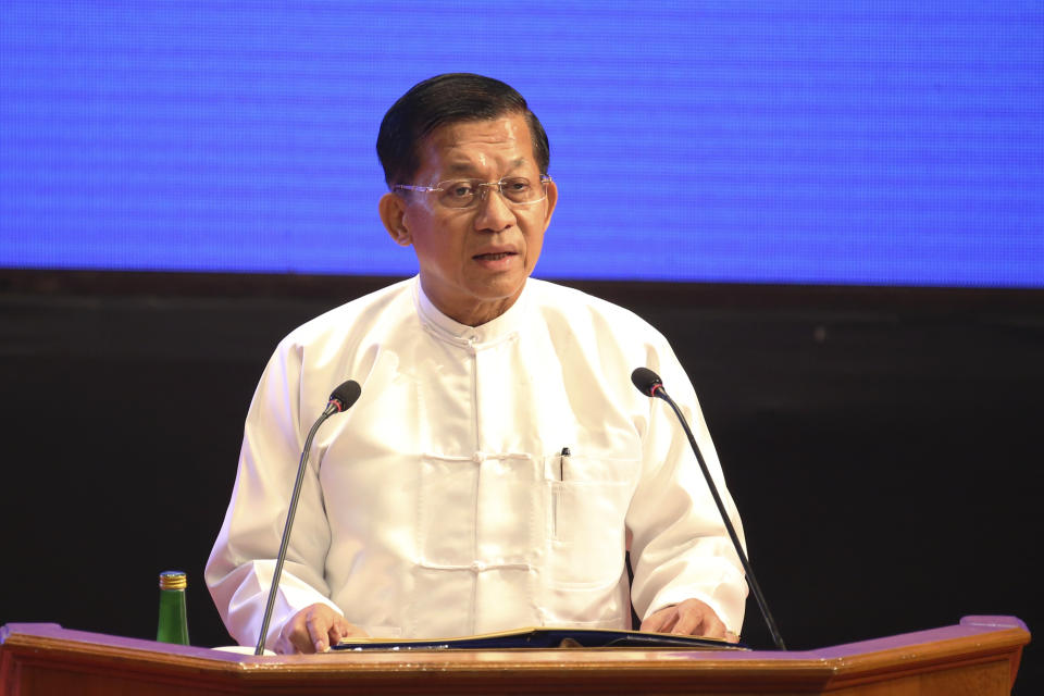 Senior Gen. Min Aung Hlaing, head of the military council, delivers a speech during a ceremony to mark the 8th anniversary of the Nationwide Ceasefire Agreement (NCA) at the Myanmar International Convention Center in Naypyitaw, Myanmar, Sunday, Oct. 15, 2023. (AP Photo/Aung Shine Oo)