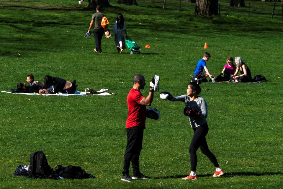 People try to keep a social distance while they enjoy a sunny day at Central Park, as the outbreak of coronavirus disease (COVID-19) continues, in the Manhattan borough of New York City, New York, U.S., April 6, 2020. REUTERS/Eduardo Munoz