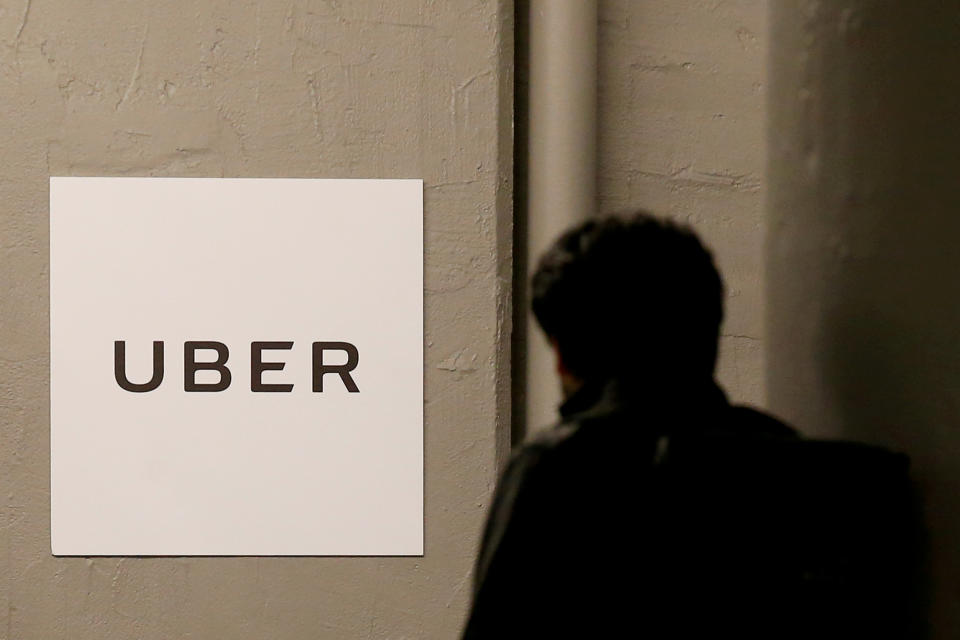 FILE PHOTO: A man arrives at the Uber offices in Queens, New York, U.S., February 2, 2017. REUTERS/Brendan McDermid/File Photo