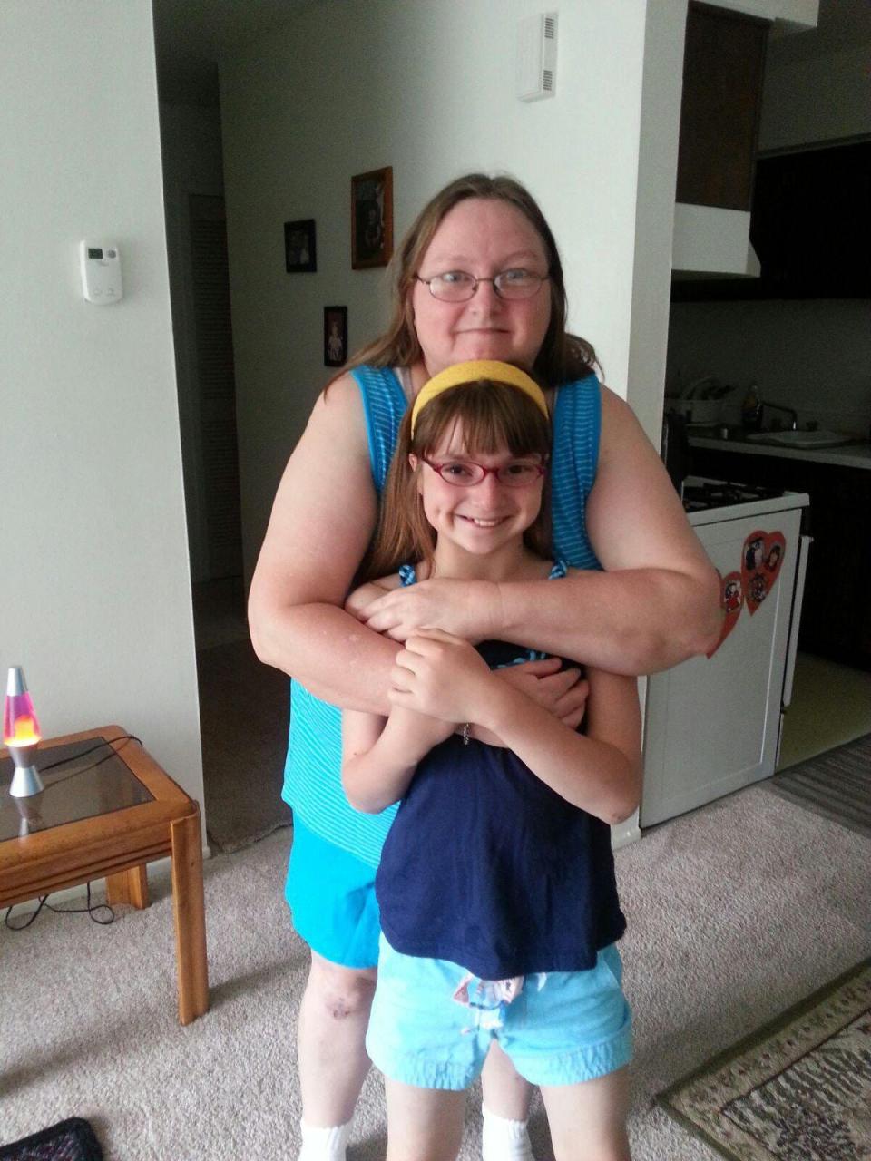 Tina Geiger, 47, and her daughter, Kristina, 11, are shown in a recent photo provided by the family. Tina Geiger, 47, and her daughter, Kristina, 11, were found just before 3 p.m. on July 30, 2013, in their second-floor unit on North Grange Street in the Parkway Village apartments.