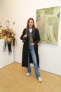 <p>At a recent art exhibition at the Cob Gallery in North London, Chung modelled a classic double-denim look elevated by a formal jacket that she layered over a simple sweater to add a hint of pattern.</p>